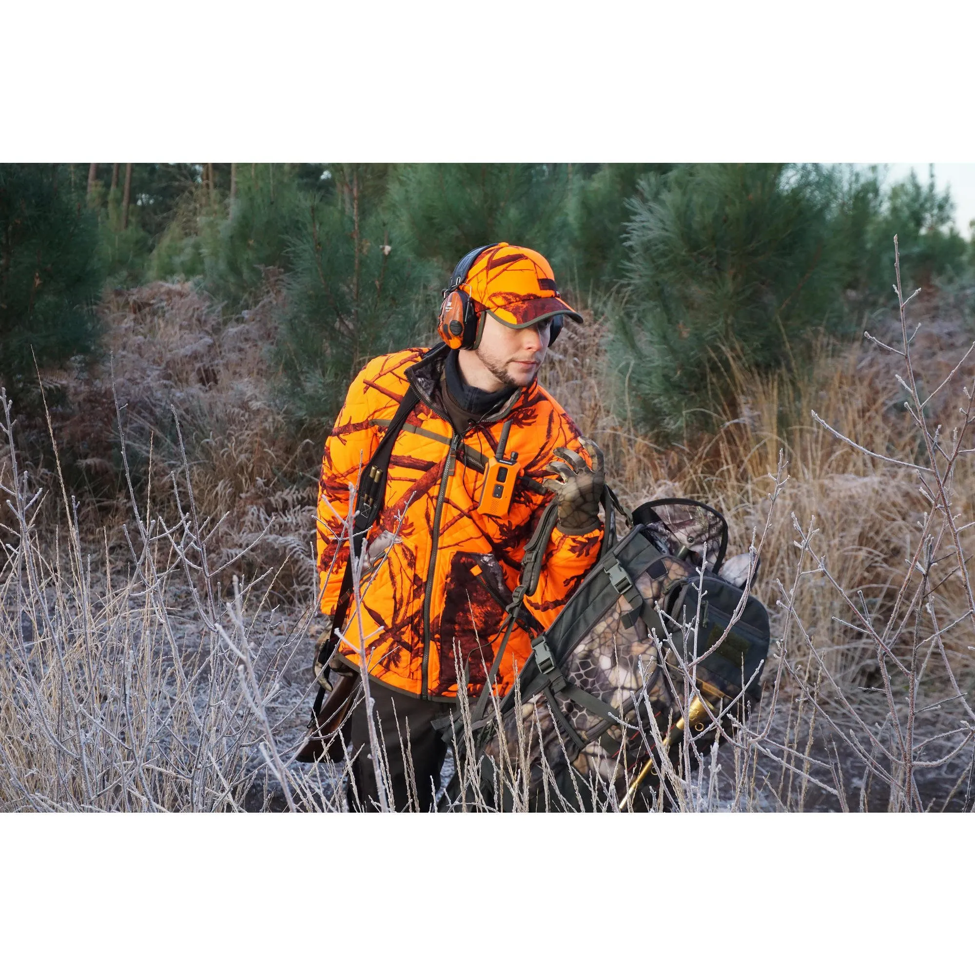 Hunting cap with earflaps camouflage orange SOLOGNAC, neon orange psa